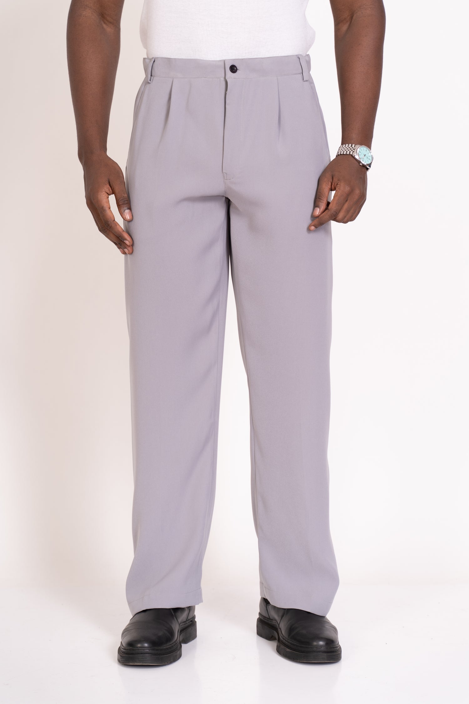 strada Light grey pleated pants worn by a person on a white background